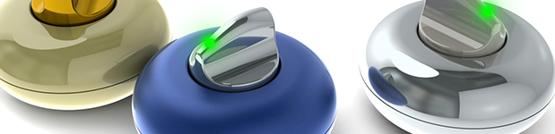 A close up of three round, donut shaped devices in shiny gold, matte blue, and chrome, all with metal knobs sporting a glowing green light in the top middle.