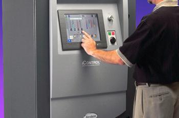 A man is shown interacting with the iControl integrated control system.