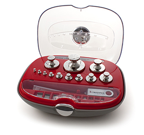 The precision weight case is shown open, with a view the weights carried inside.